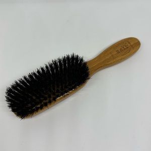 Boar Bristle Bamboo Brush by Bass. It’s a tongue twister! Best for fine hair/fur